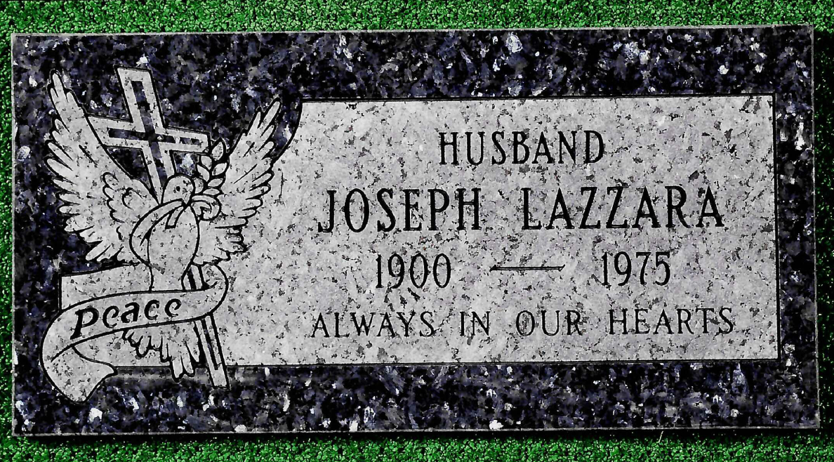 A black granite grave marker for Joseph Lazzara (1900–1975), featuring a dove, cross, and the words 