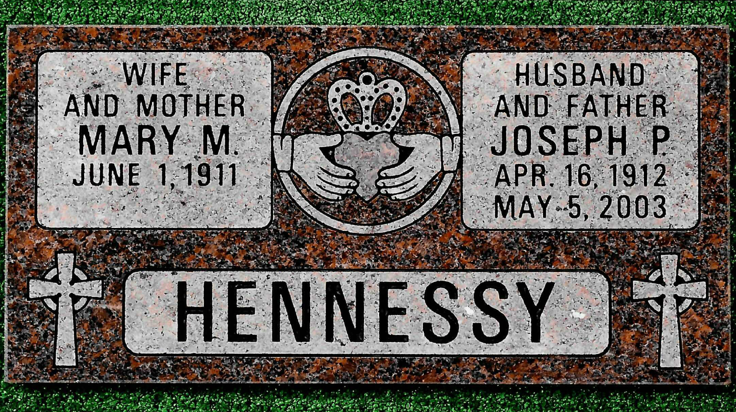 A red granite gravestone for the Hennessy family, featuring two Celtic crosses, a Claddagh symbol, and names and dates.