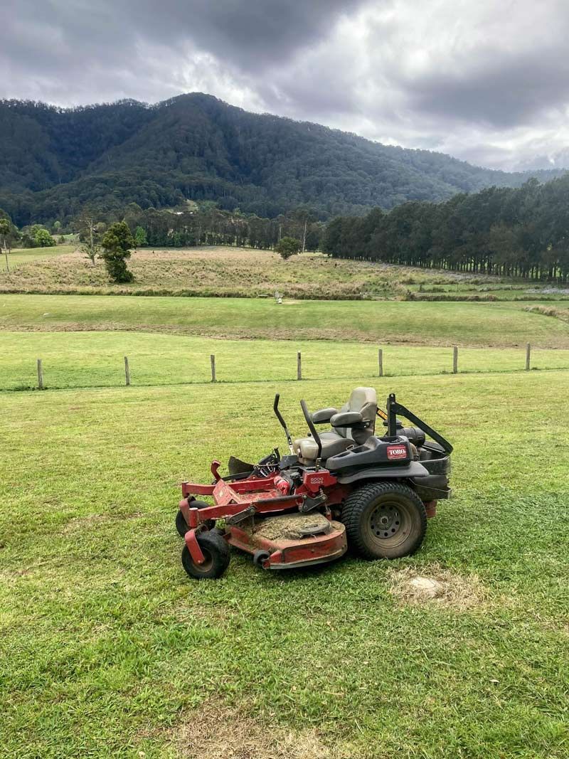 Powerful Lawn Mower With Scenic Landscape And Mountain Backdrop — All Assist In Bonville NSW