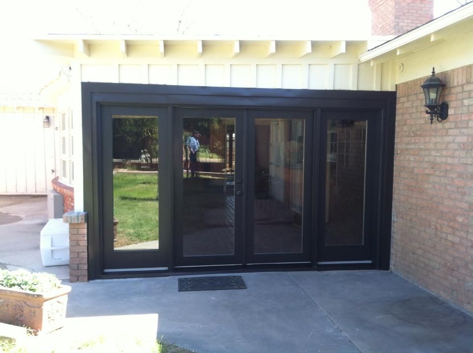 A house with a lot of windows and doors