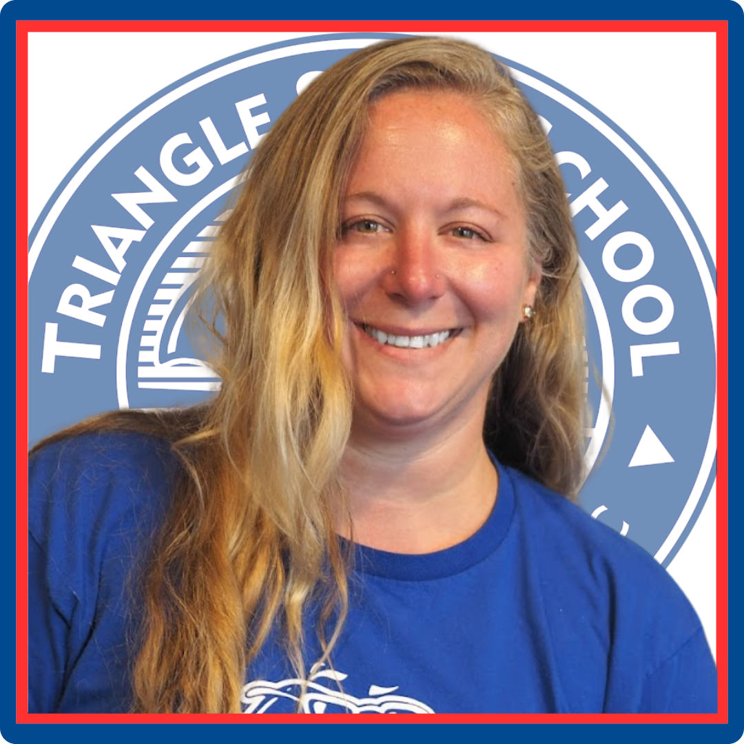 A woman is smiling in front of a triangle school logo