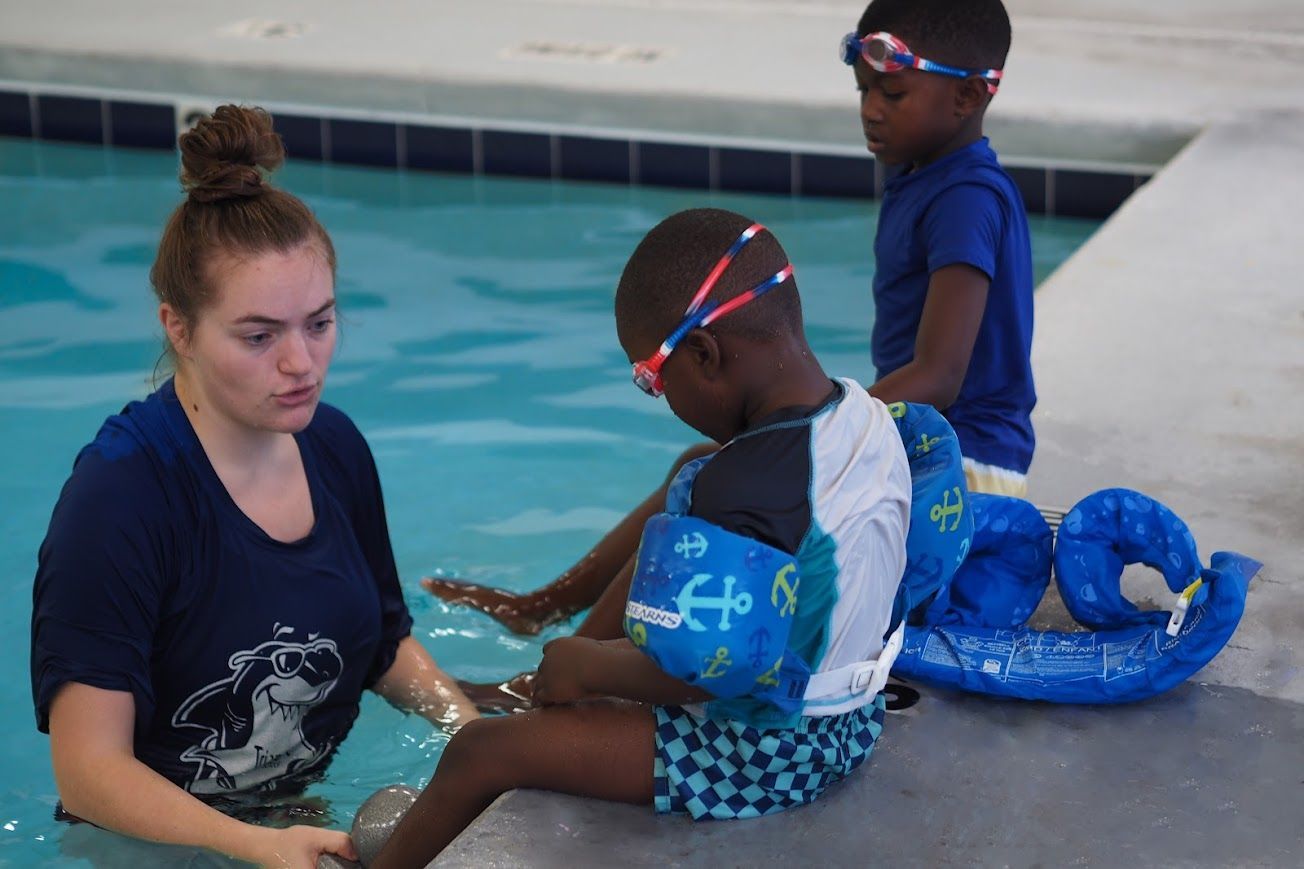 Siblings and friends swim lessons