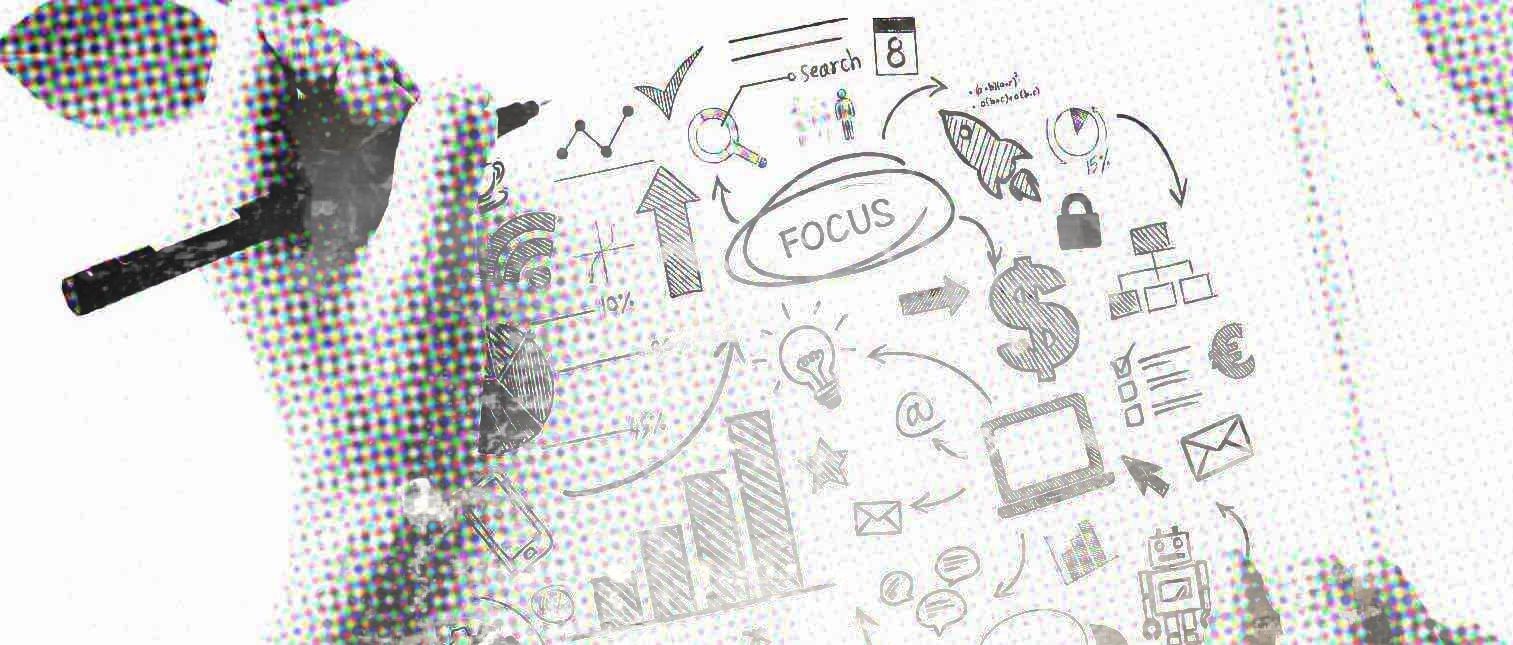 Hand writing marketing plan on faded graphic