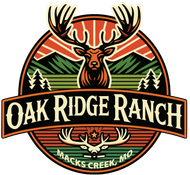 A black and white logo for oak ridge ranch with a deer and a target.