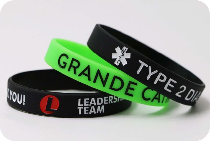 Debossed Filled in Color Silicone Wristband - CustomLanyards
