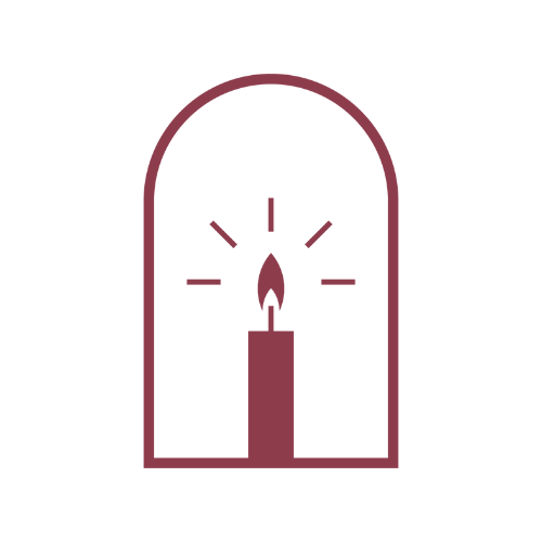 Burgundy candle inside a lantern, radiating light.