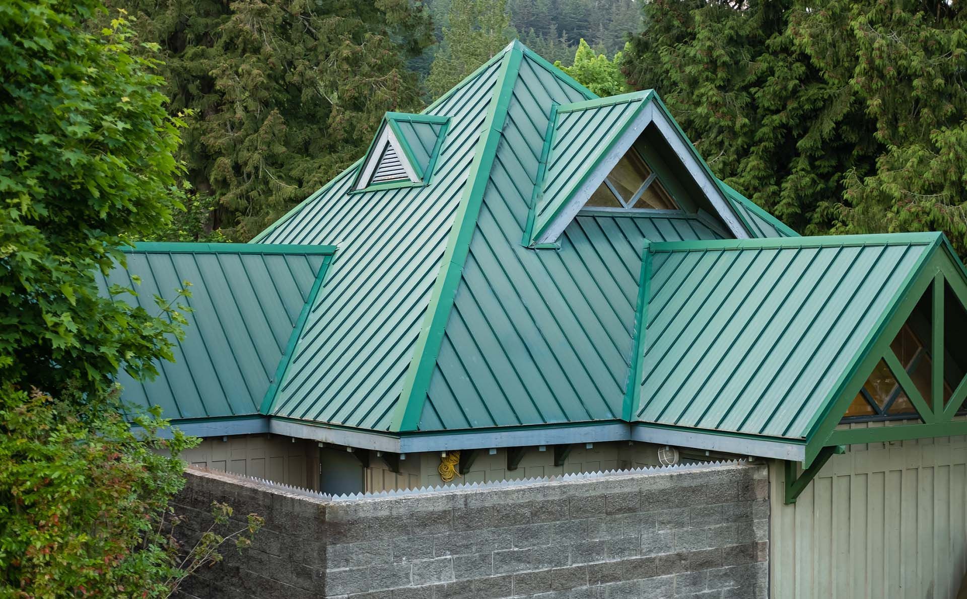 green metal roof with covered windows