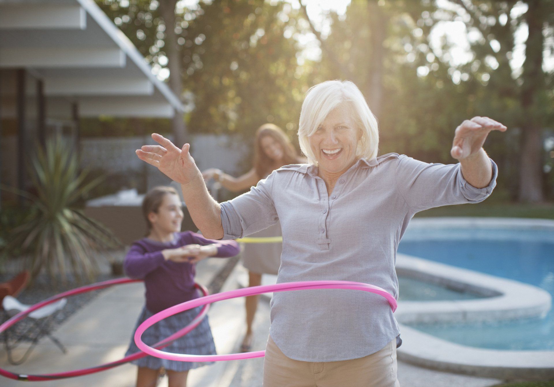 Happy Lady Playing Hula-hoop — Fruitland Park, FL — Tri-County Caregiver Resource Center
