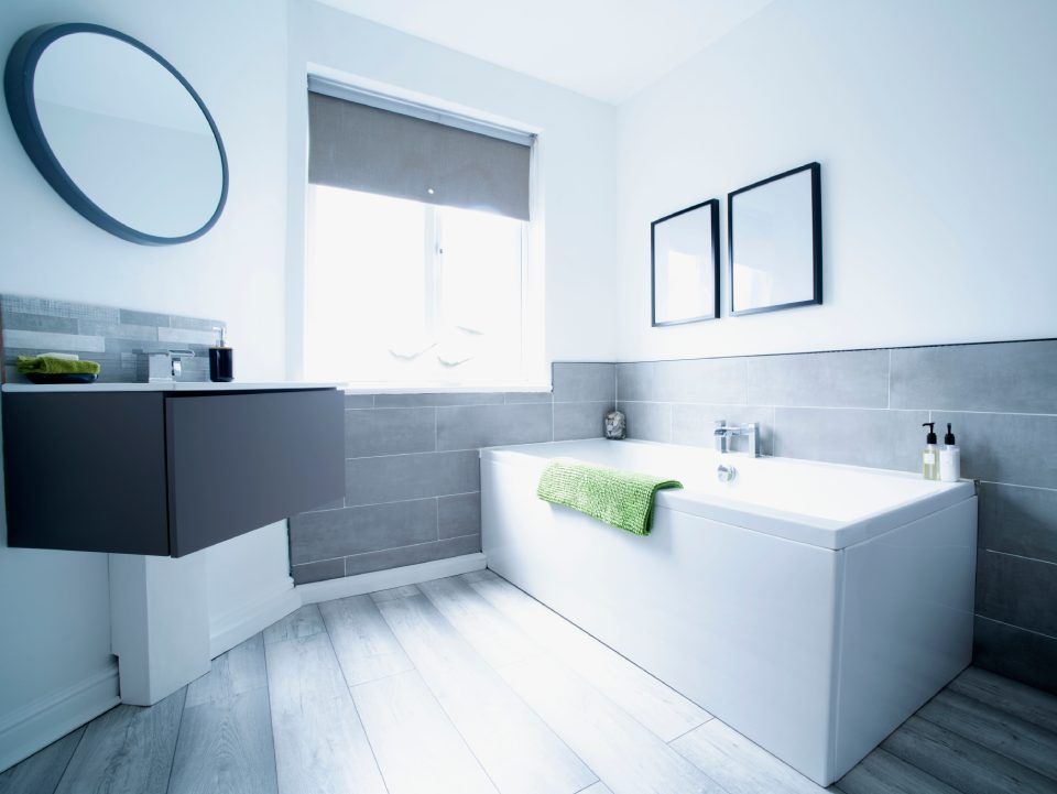 bright elegant bathroom interior in a luxury house
