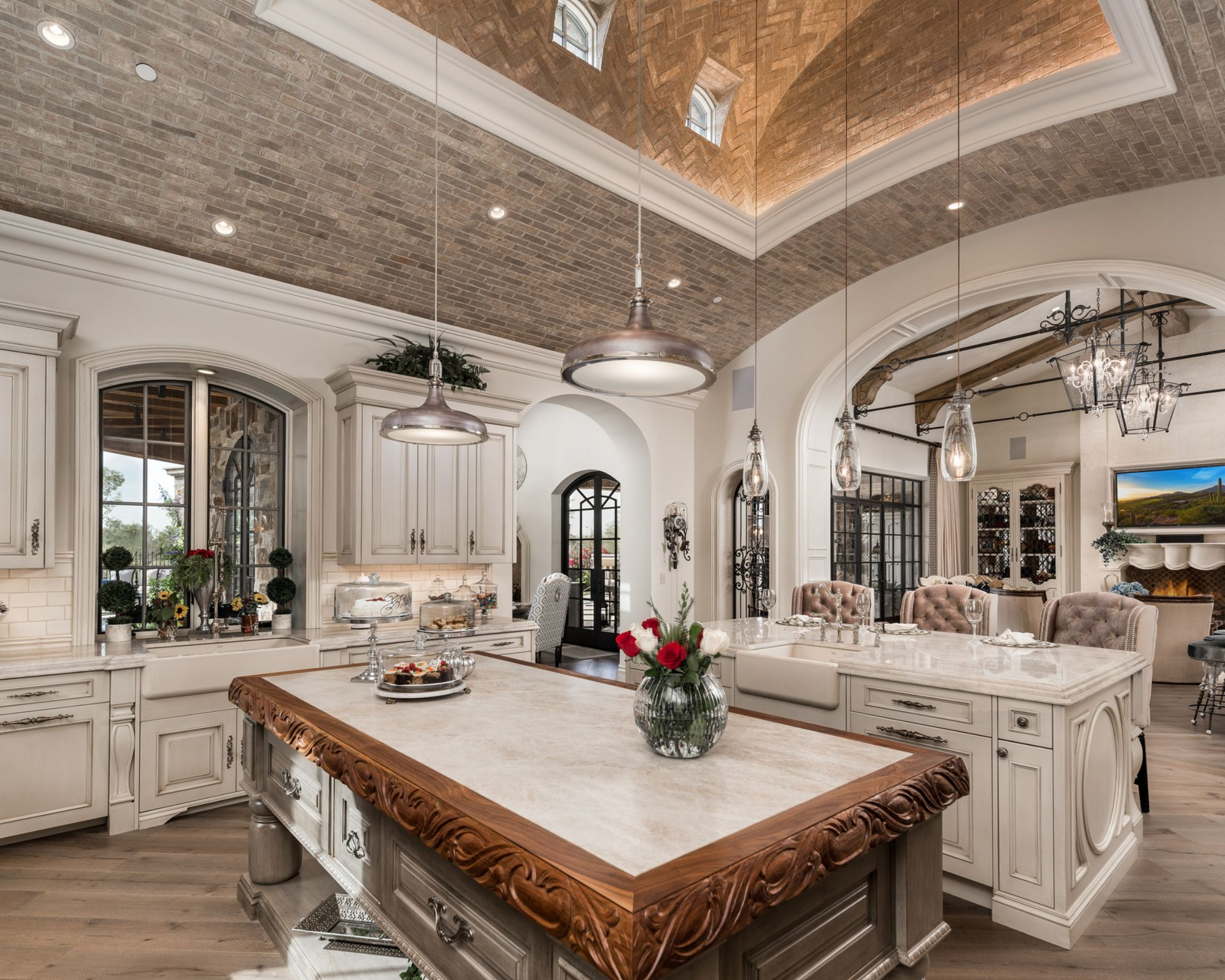 Luxury kitchen design featuring spacious island and stone countertops