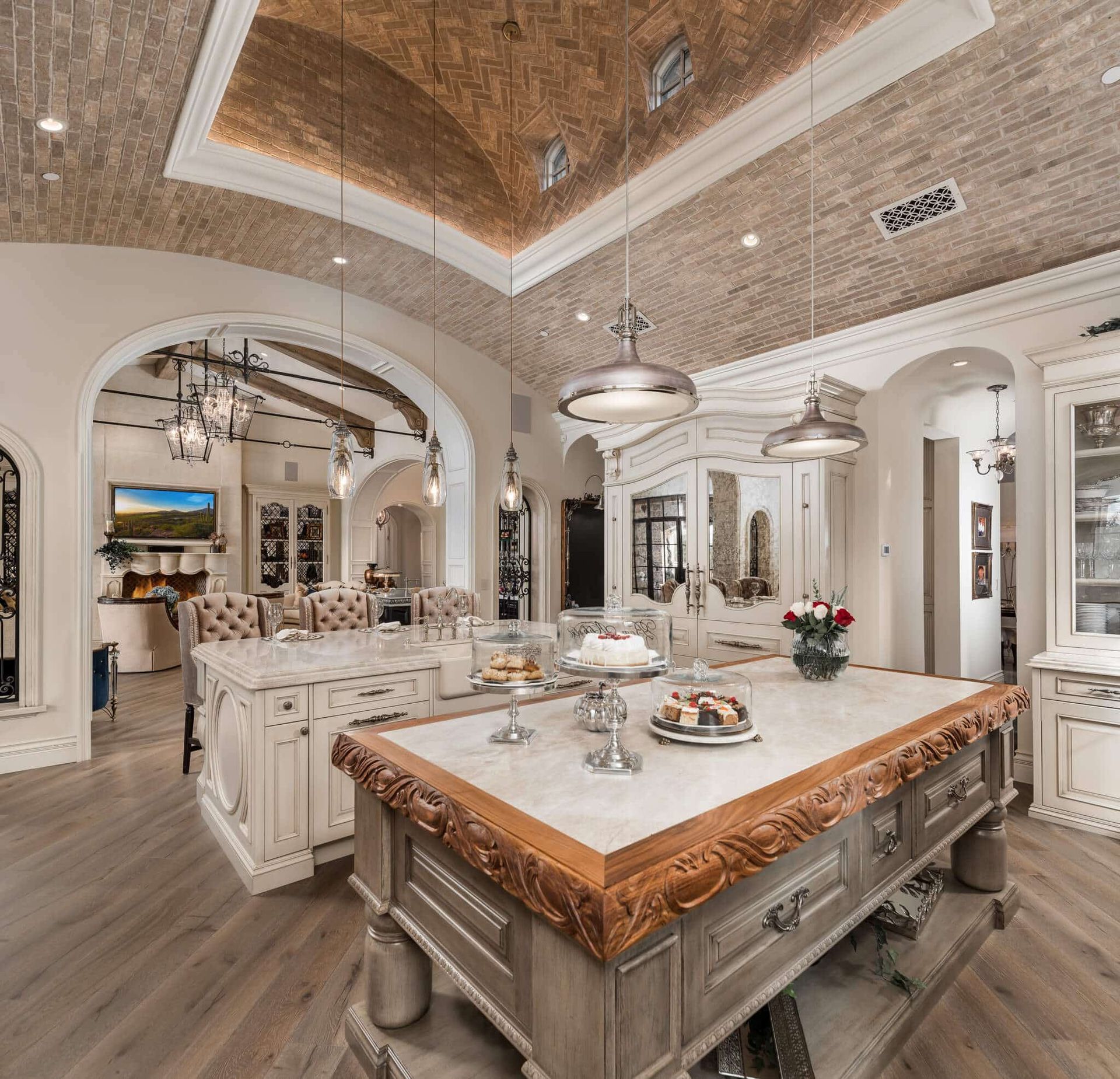 A kitchen with a large island in the middle of it