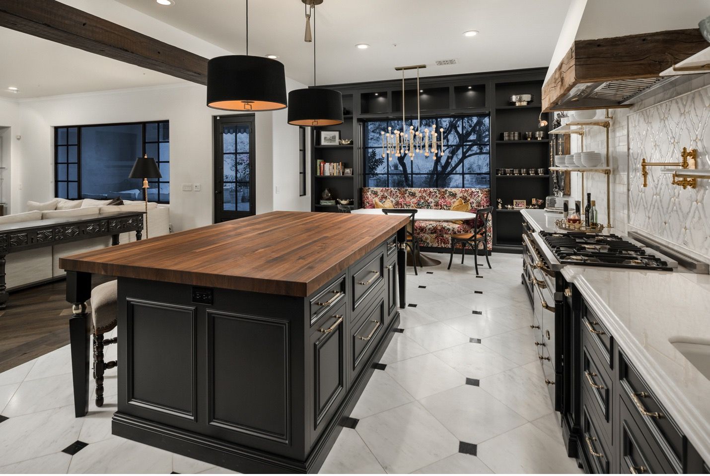 There is a large island in the middle of the kitchen.