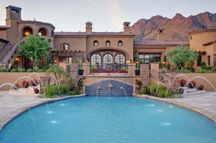 Luxury concrete pool with custom finishes and built-in features