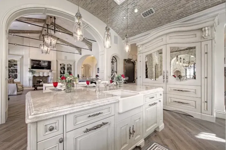 Kitchen with integrated appliances and neutral cabinets
