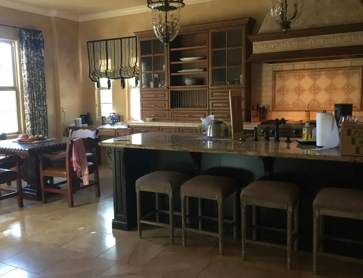 Kitchen before renovation, showing original layout and finishes prior to modern design updates