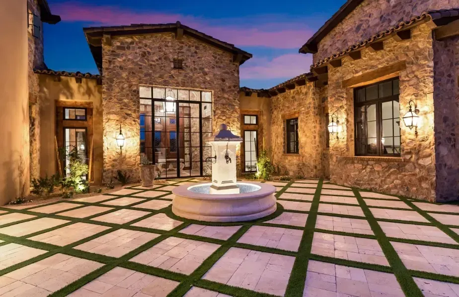 Courtyard connecting indoor and outdoor spaces in a luxury custom home