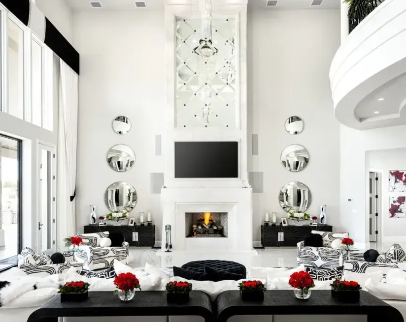 Modern estate luxury home with double staircase and custom crystal chandelier