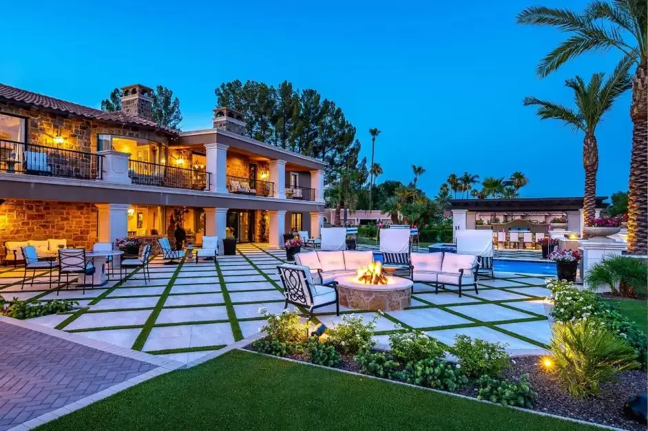 Luxury backyard with pool, pergola, and firepit