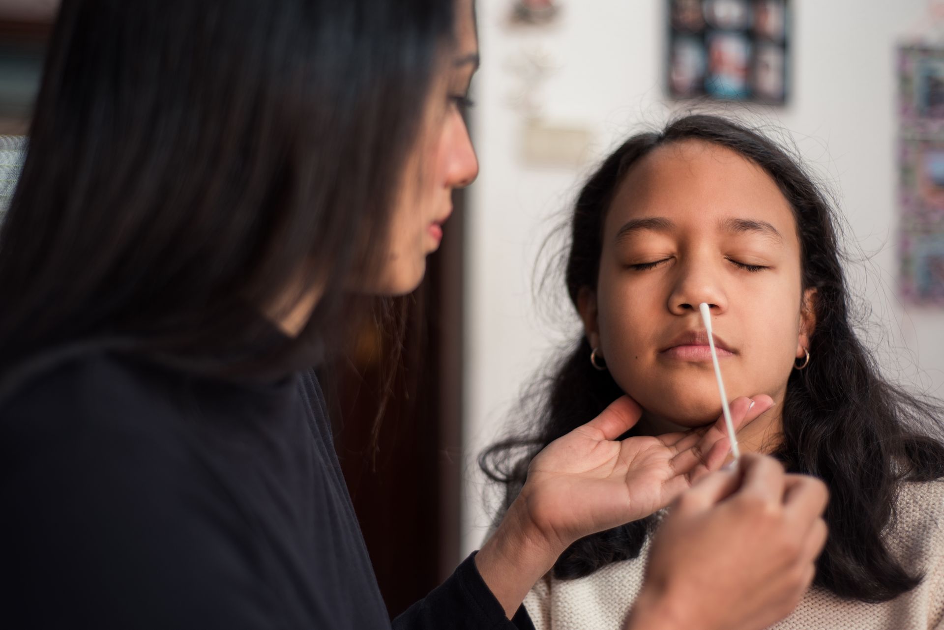 young girl getting a COVID test