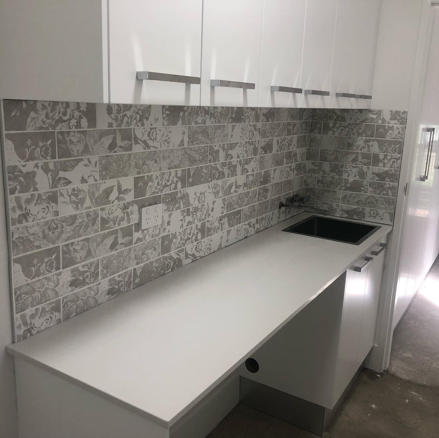 A Kitchen with White Cabinets, a White Countertop, and a Sink — Expert Cabinetmaker on the Sunshine Coast QLD