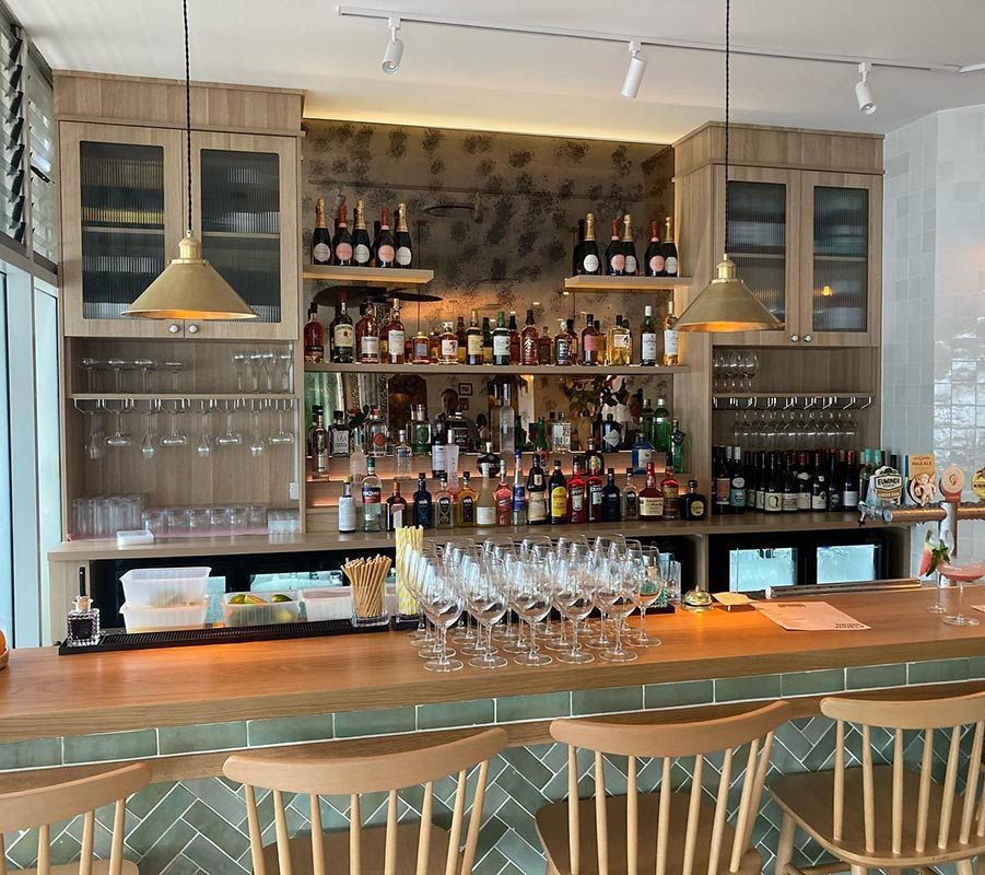 A Bar adorned with Plentiful Wine Glasses — Expert Cabinetmaker on the Sunshine Coast QLD