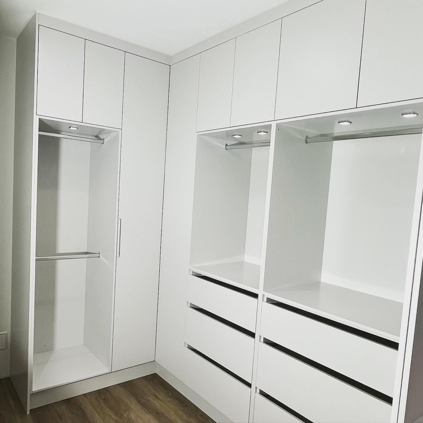A Walk-in Closet featuring White Cabinets and Drawers for Storage — Expert Cabinetmaker on the Sunshine Coast QLD