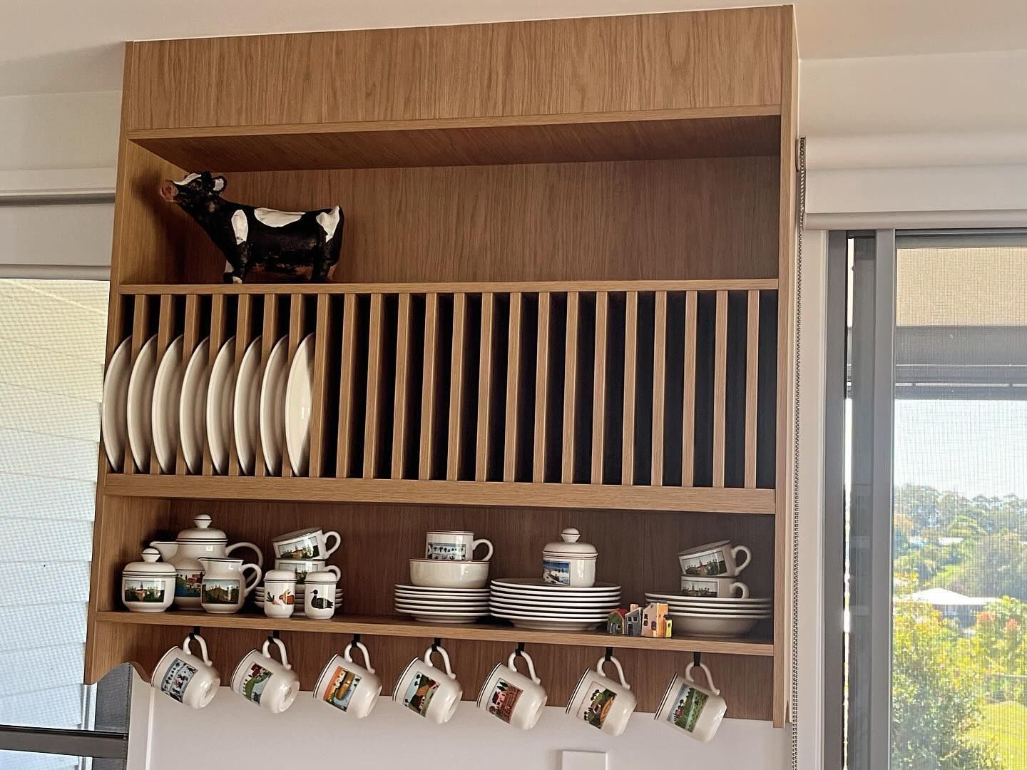 A Wooden Shelf Displaying Plates and Cups — Expert Cabinetmaker on the Sunshine Coast QLD