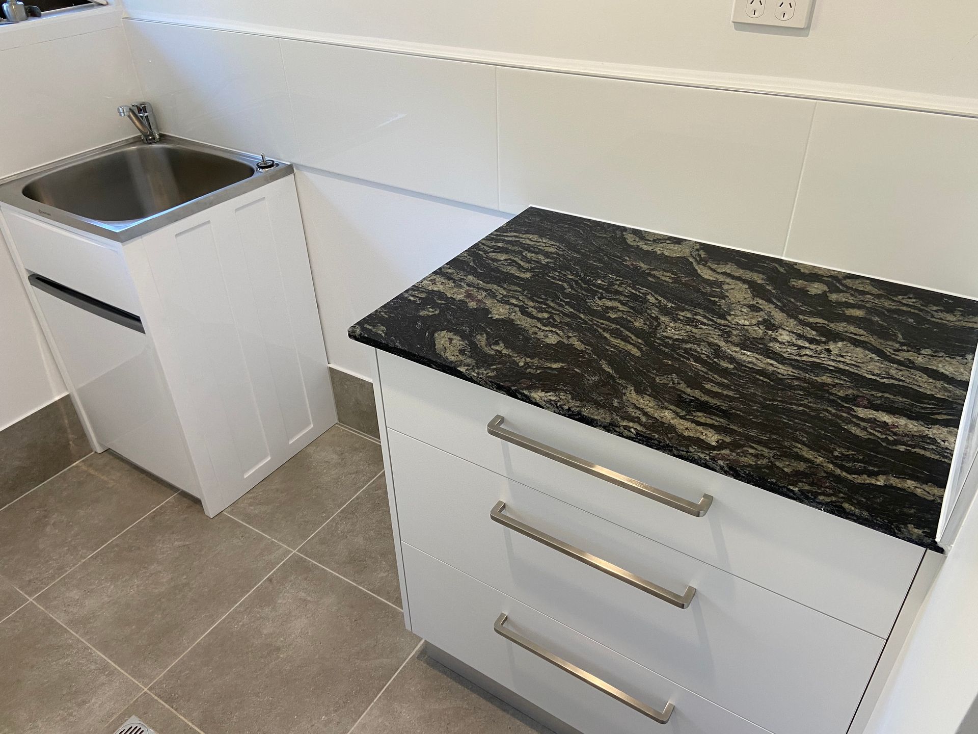 Laundry Room with Sink, Washer, and Dryer — Laundry Renovations on the Sunshine Coast QLD