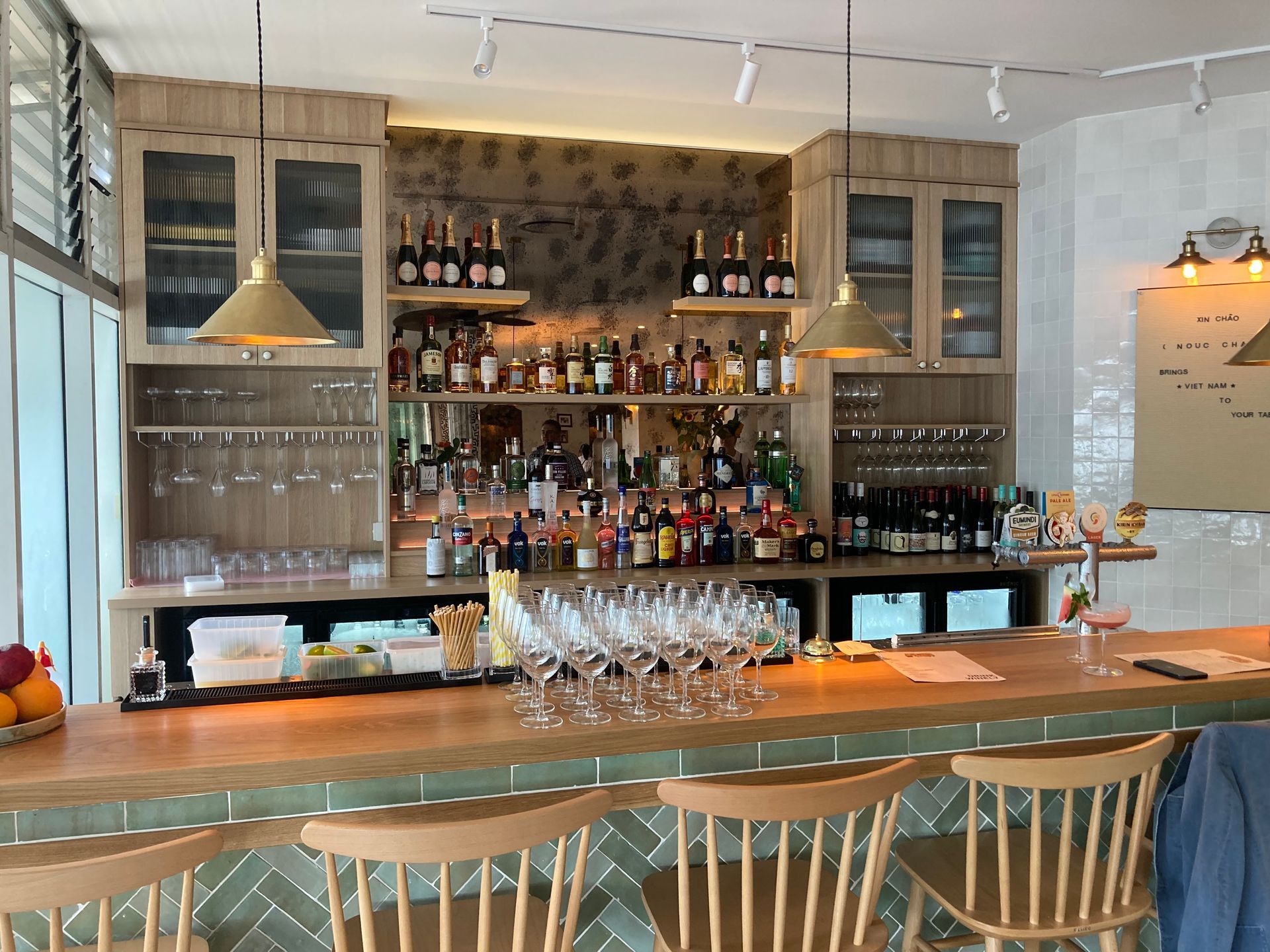 Unique Island Bar Cabinets Sticks with Bottles — Cabinetmaker in Sunshine Coast in Rosemount, QLD