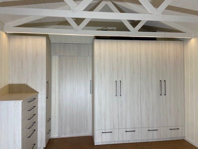 A Room adorned with Abundant White Cabinetry and Drawers — Expert Cabinetmaker on the Sunshine Coast QLD