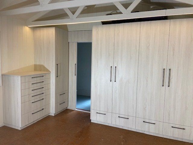 A Room with Abundant White Cabinets and Drawers — Expert Cabinetmaker on the Sunshine Coast QLD