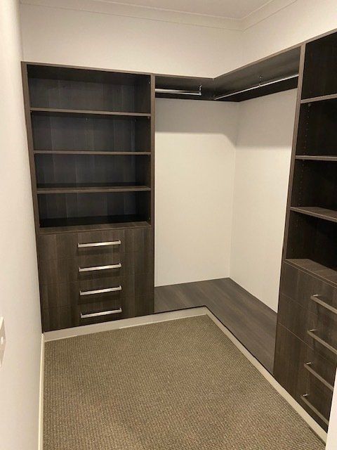 A Spacious Walk-in Closet Featuring Abundant Shelves and Drawers — Expert Cabinetmaker on the Sunshine Coast QLD