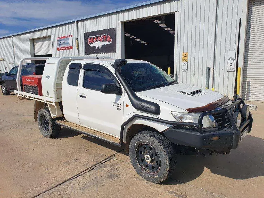 A White Truck is Parked in Front of a Building — Dynamic Performance Systems In Kelso, NSW