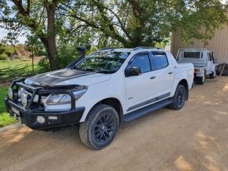 A White Truck With a Black Bumper is Parked on a Dirt Road — Dynamic Performance Systems In Kelso, NSW
