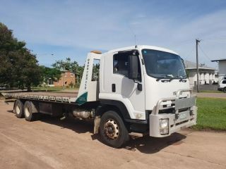 A White Tow Truck is Parked on a Dirt Road — Dynamic Performance Systems In Kelso, NSW