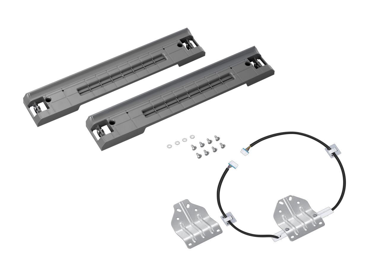 Un juego de correderas para cajones grises, placas de montaje de metal, un cable negro y tornillos