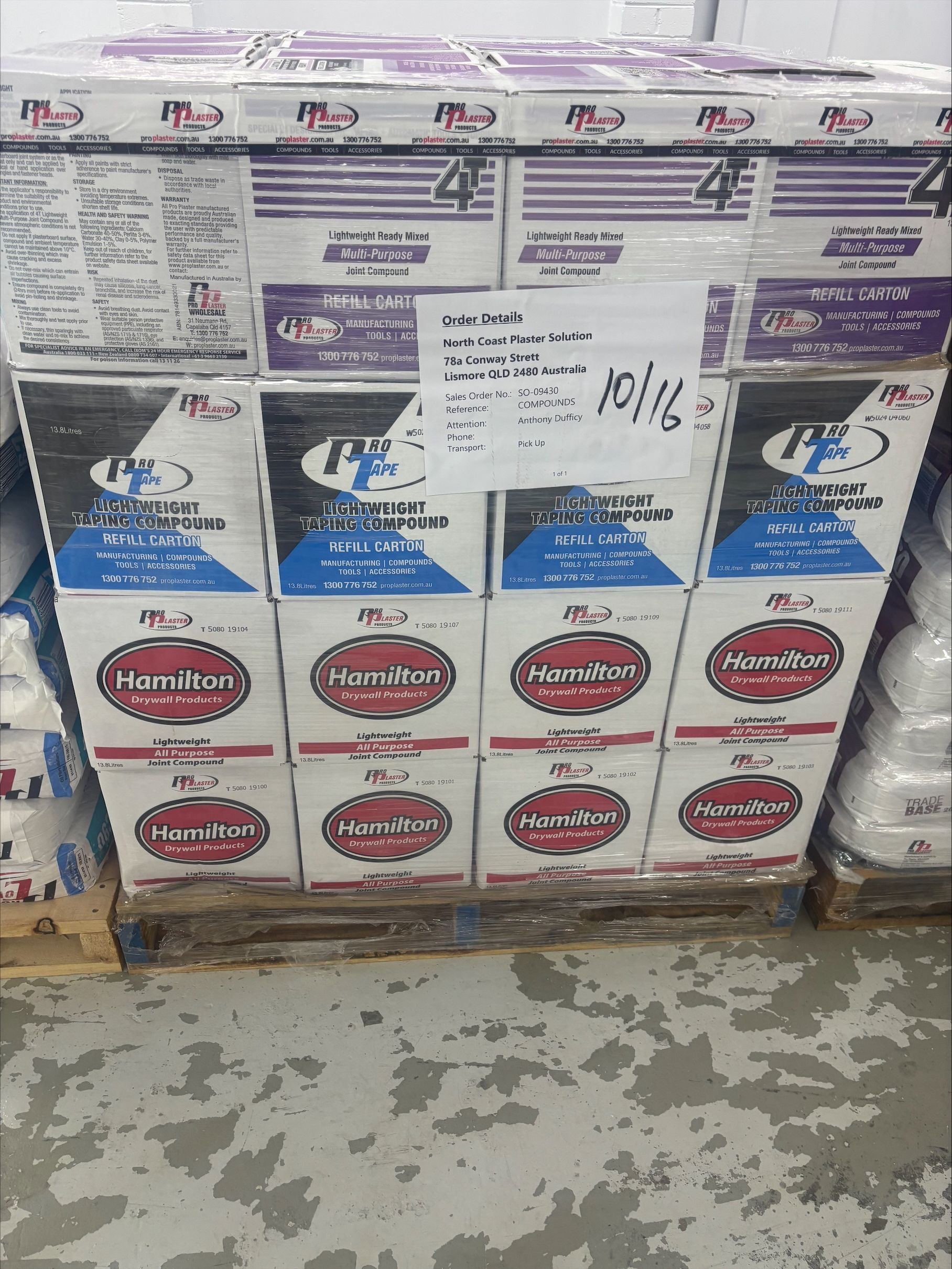 A Large Stack Of Plastering Compound On Top Of A Wooden Pallet — North Coast Plaster Solutions in Lismore, NSW