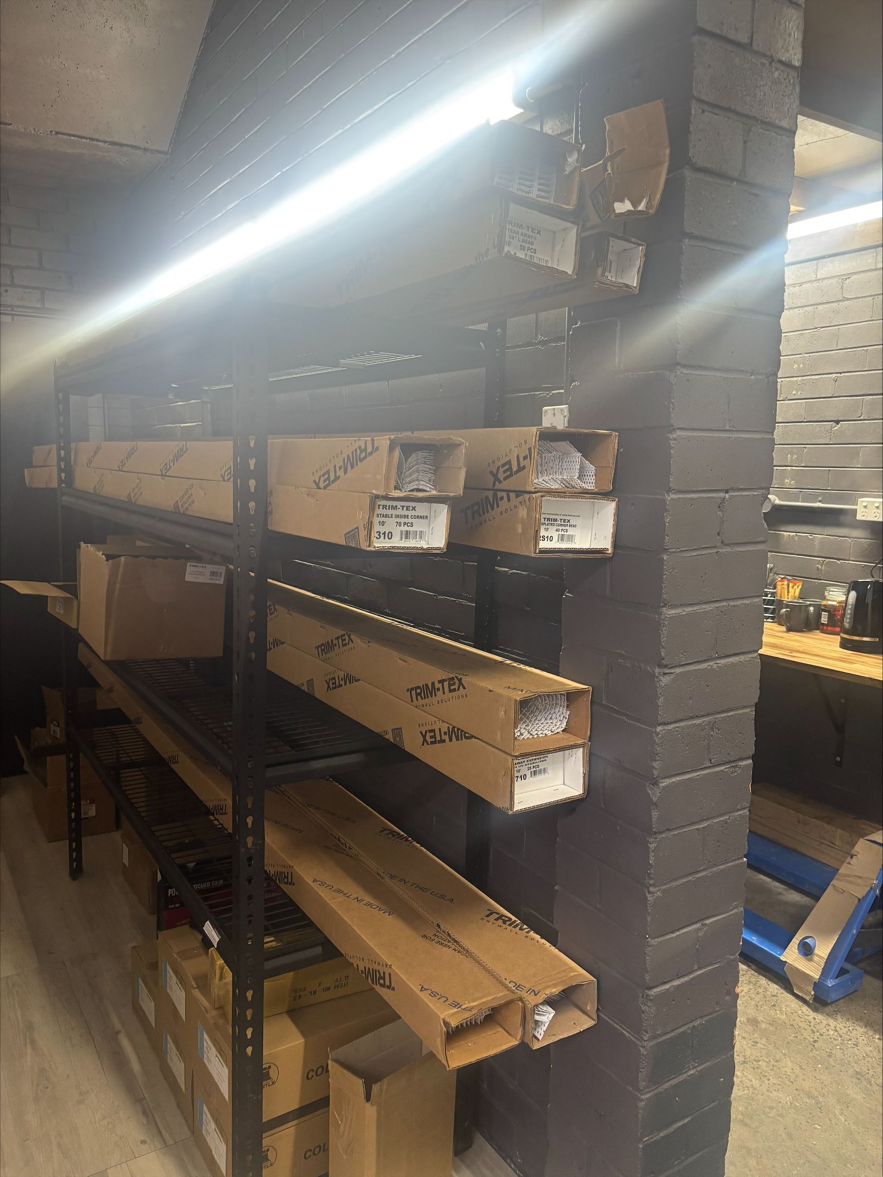 A Black Shelf Is Holding A Set Of Plastering Tools
— North Coast Plaster Solutions in Lismore, NSW