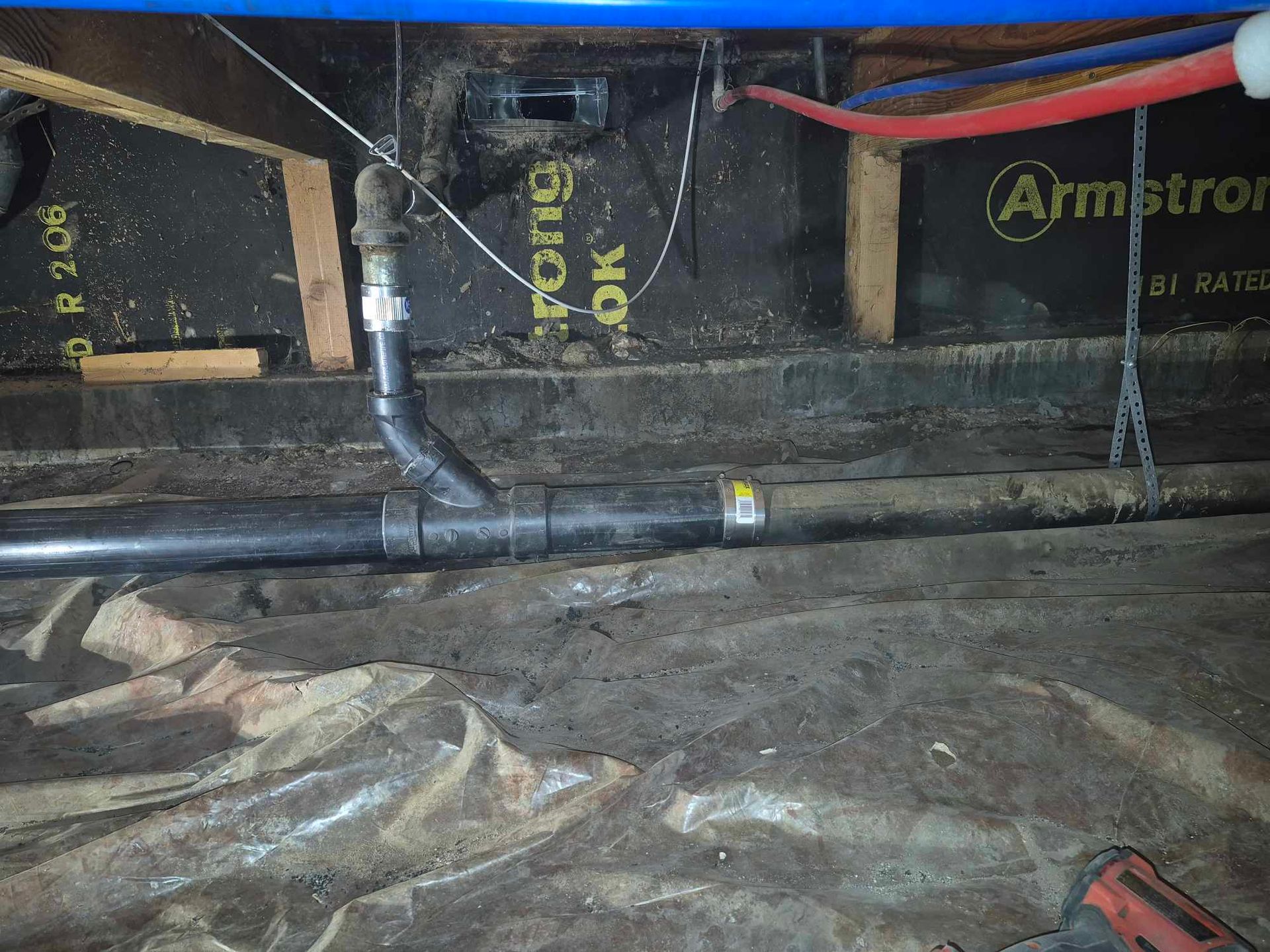 A black and white photo of a person holding a brush.