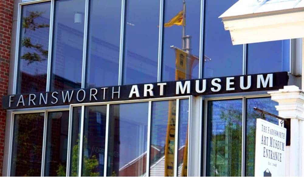 A large building with a sign that says ' arnsworth art museum ' on it