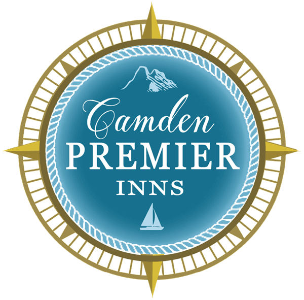 The logo for camden premier inns has a compass on it