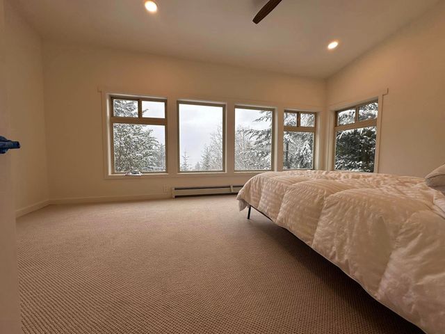 Living room with modern sectional and natural light