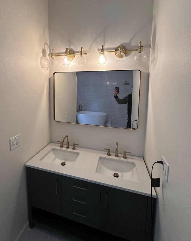 Bathroom mirror and vanity installation