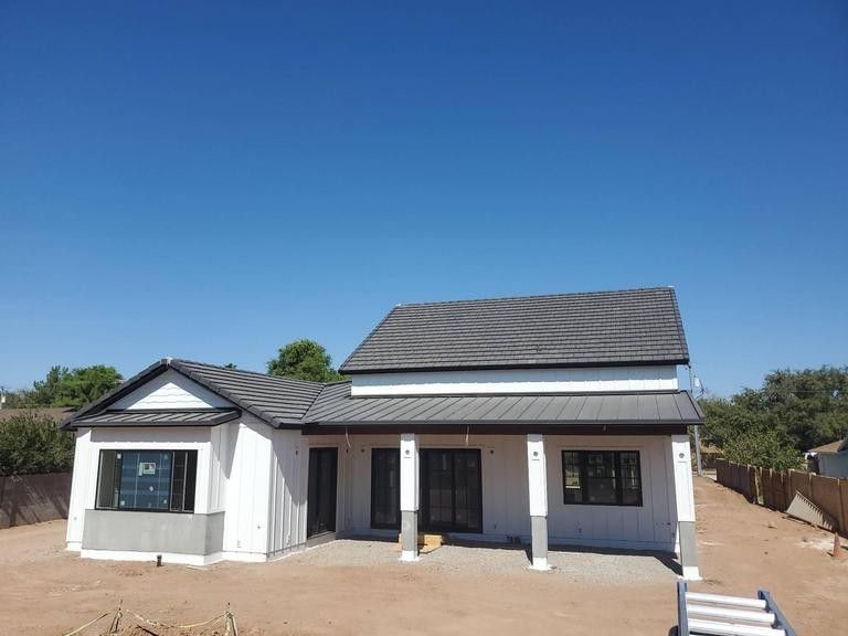 roofer worker using air pneumatic nail