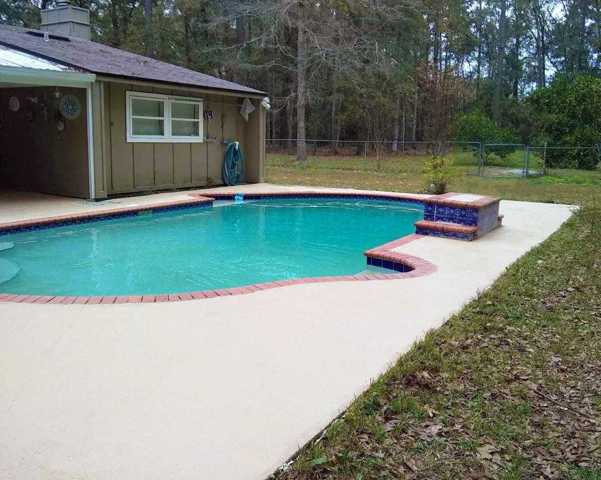 Newly Painted Backyard Pool Deck — Gainesville, FL — Florida Leisure Pool & Spa