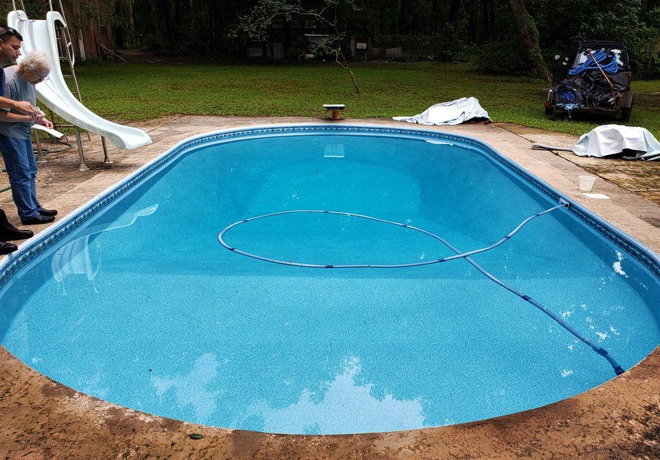 Unused Pool with Slide After — Gainesville, FL — Florida Leisure Pool & Spa