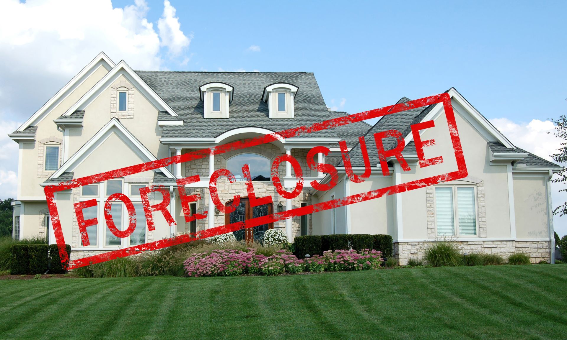 A house with a foreclosure stamp on it