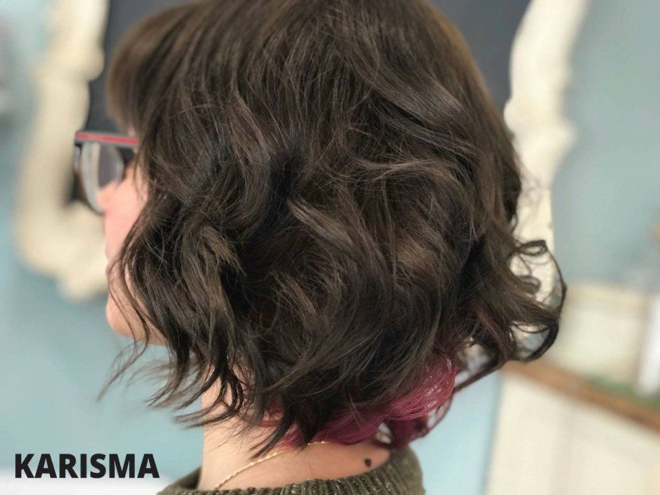 taglio capelli mossi corti