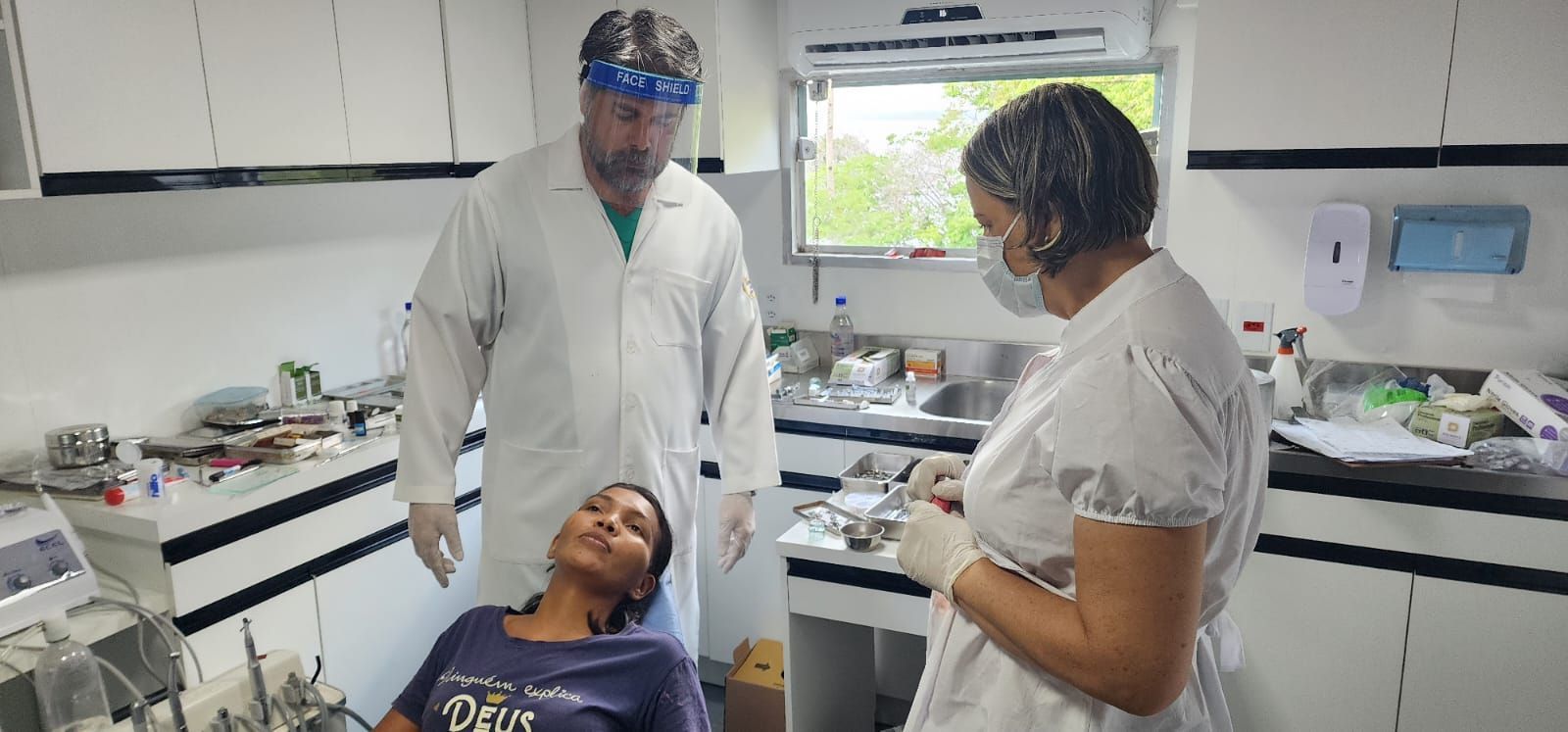 Classroom: Students with diverse backgrounds raise hands, engaged in learning.