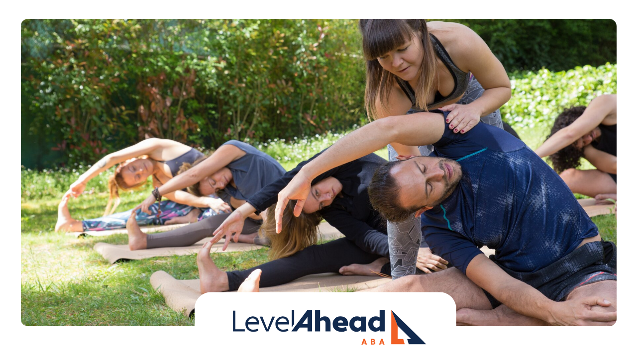 A group of autistic adults doing yoga exercises